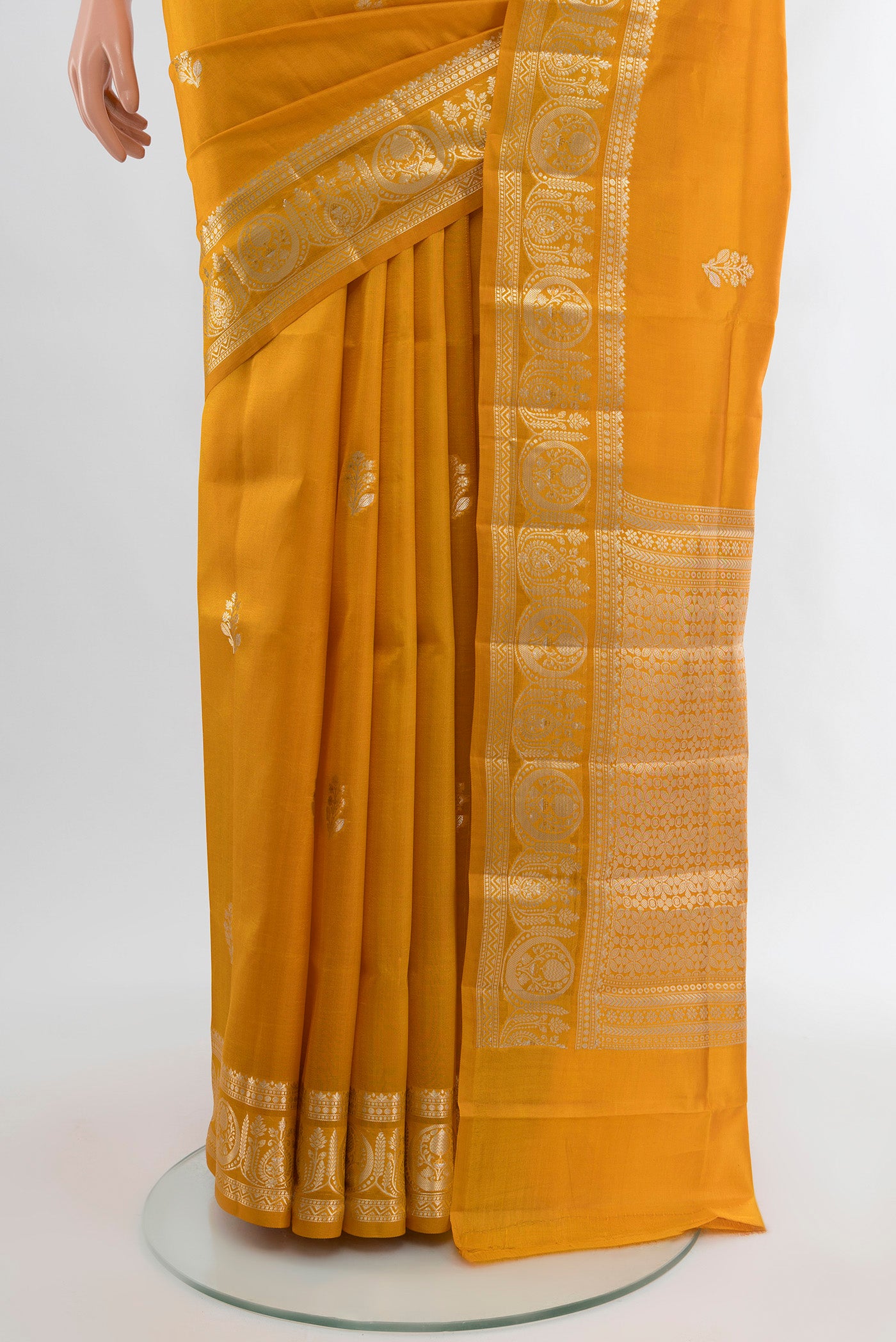 Pleats and pallu of Mustard Banarasi Raw Silk Saree with Zari Butta on the body and Zari Border. 