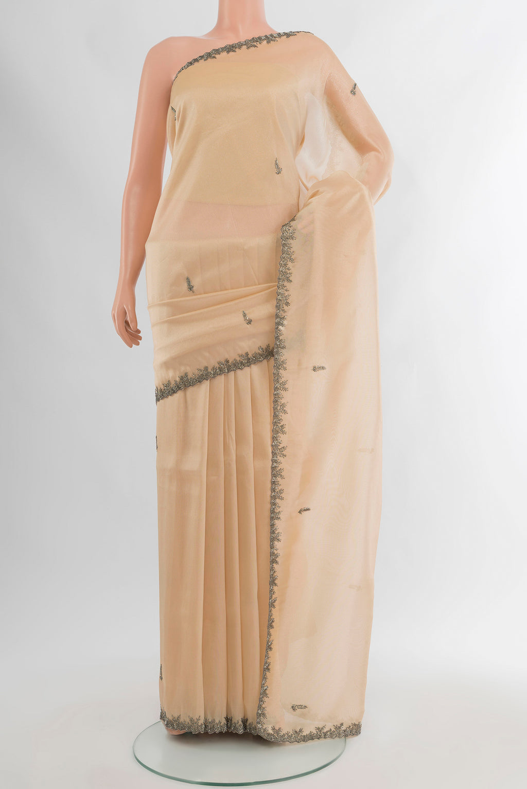Golden Blended Embroidery Net Saree with Plain Body and Embroidery Border.  displayed on a mannequin