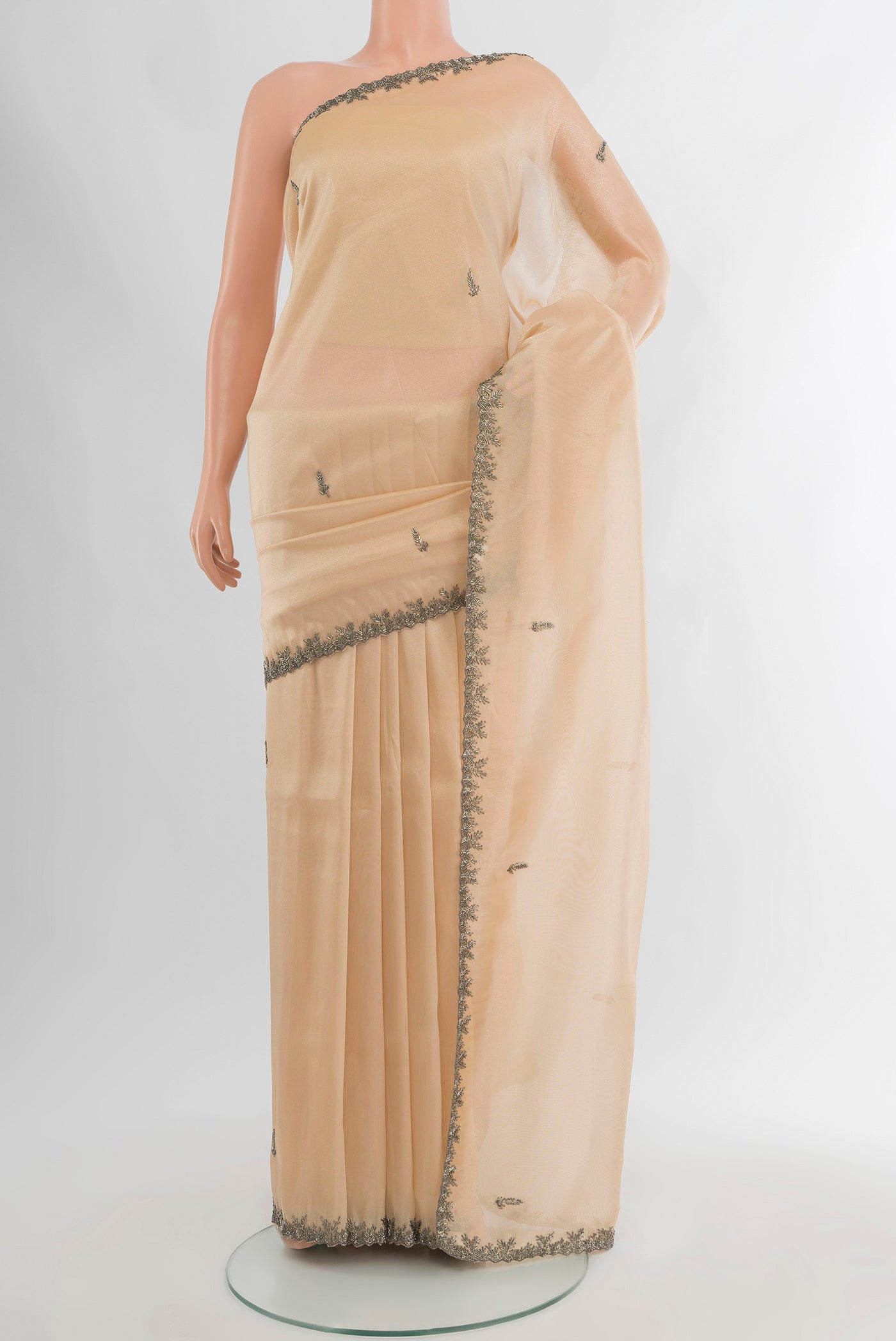 Golden Blended Embroidery Net Saree with Plain Body and Embroidery Border.  displayed on a mannequin