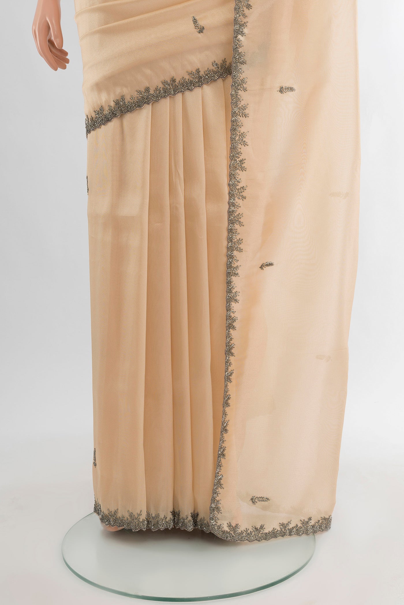Pleats and pallu of Golden Blended Embroidery Net Saree with Plain Body and Embroidery Border. 
