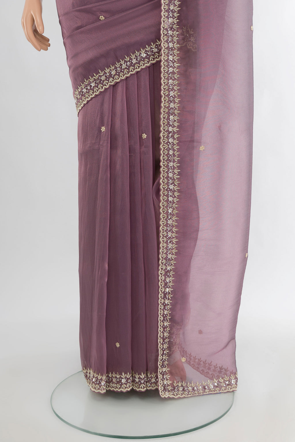 Pleats and pallu of Purple Blended Embroidery Net Saree with Plain Body and Embroidery Border. 