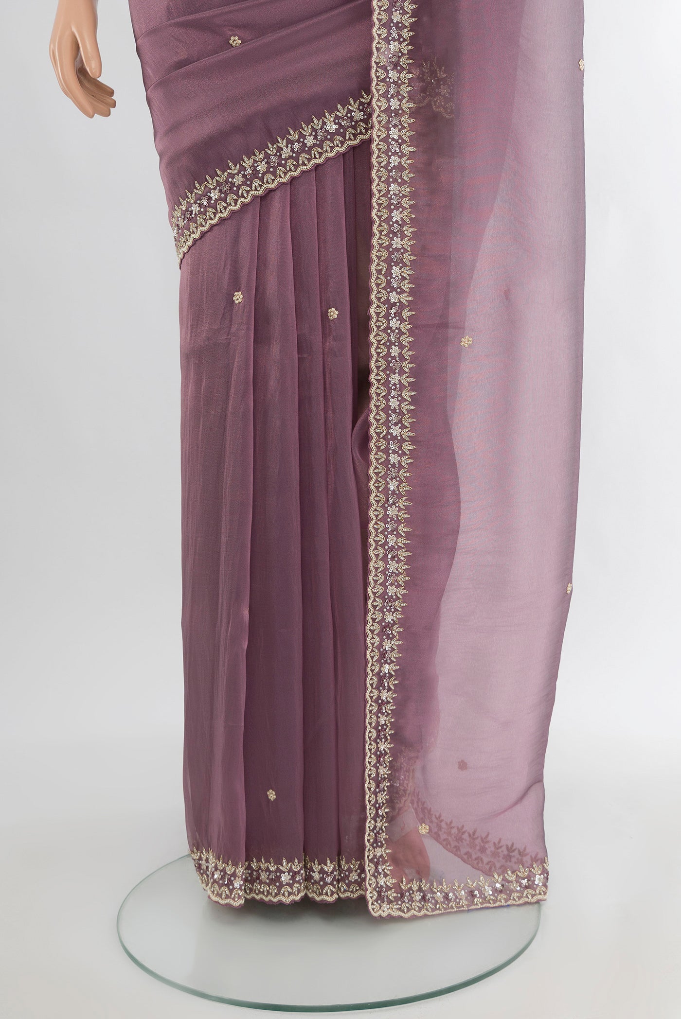 Pleats and pallu of Purple Blended Embroidery Net Saree with Plain Body and Embroidery Border. 