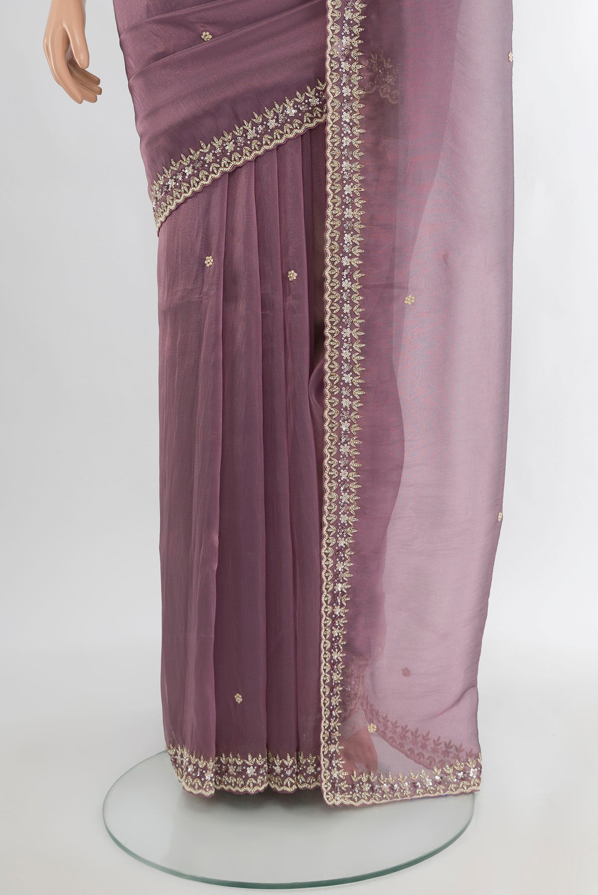 Pleats and pallu of Purple Blended Embroidery Net Saree with Plain Body and Embroidery Border. 