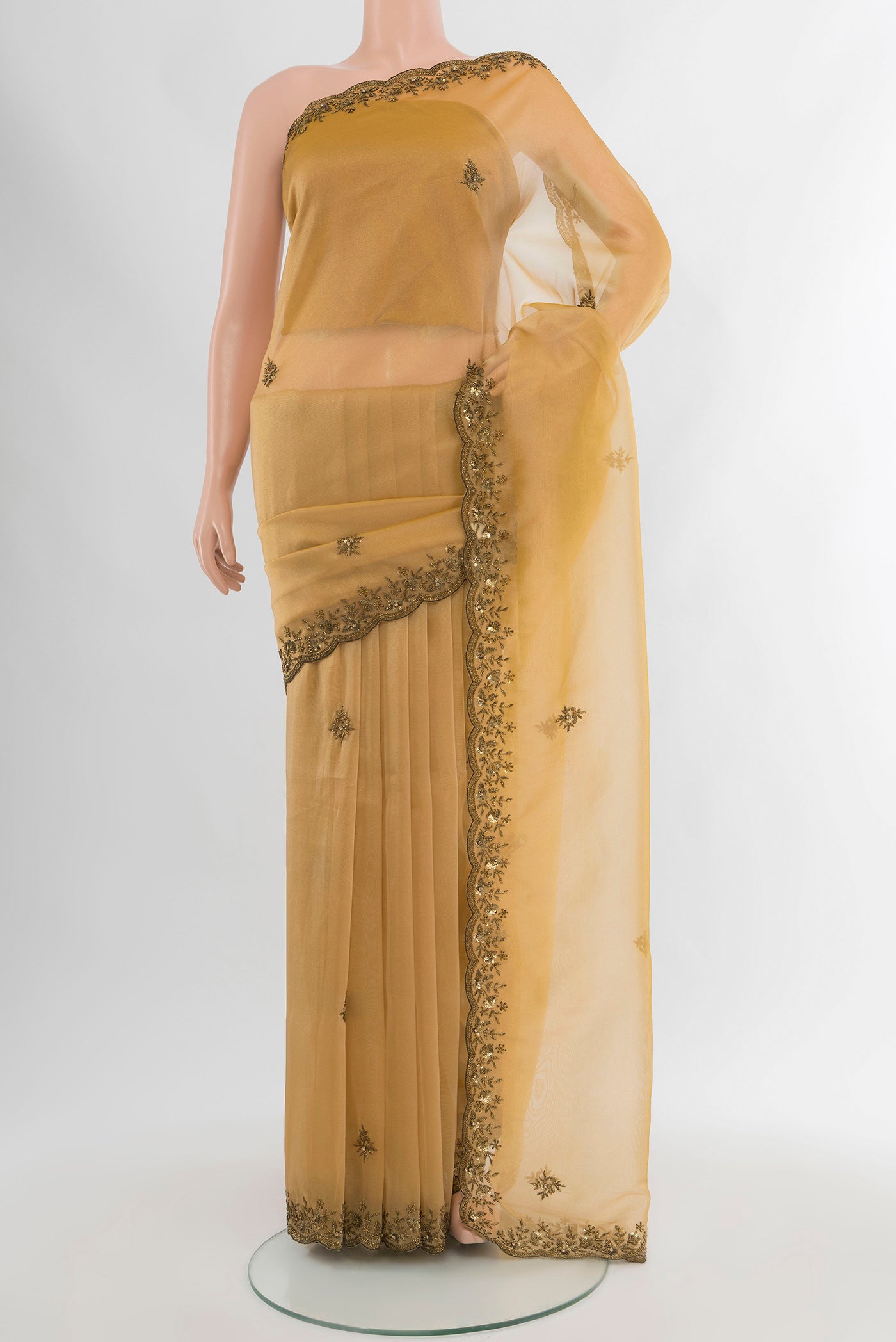 Sandal Blended Embroidery Net Saree with Embroidery on the body and Embroidery Border.  displayed on a mannequin