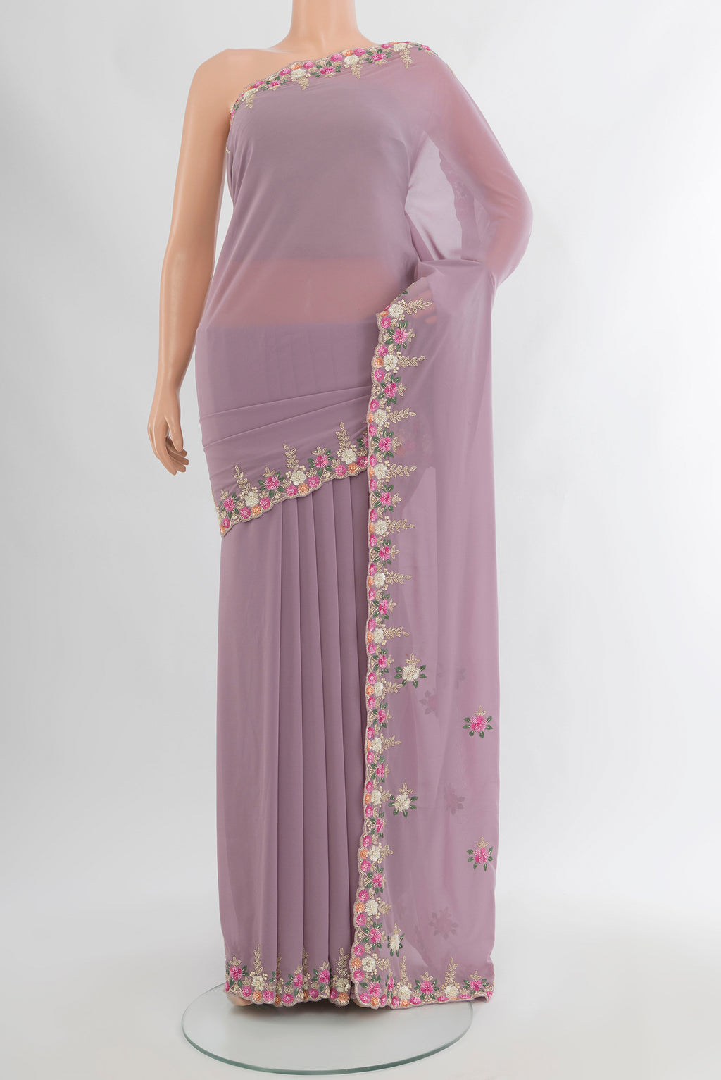 Lavender Blended Georgette Saree with Embroidery on the body and Embroidery Border.  displayed on a mannequin