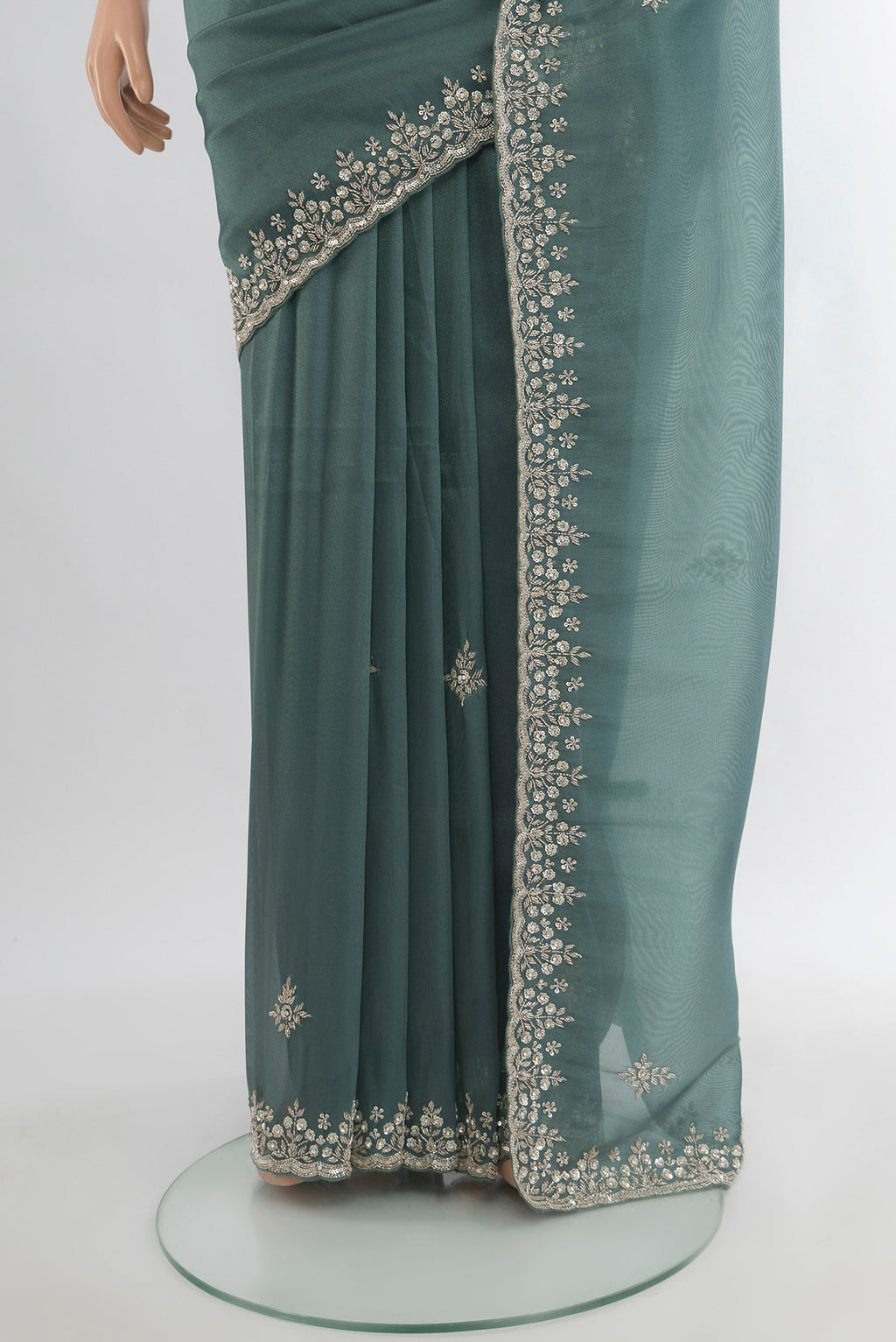 Pleats and pallu of Grey Blended Embroidery Net Saree with Embroidery on the body and Embroidery Border. 