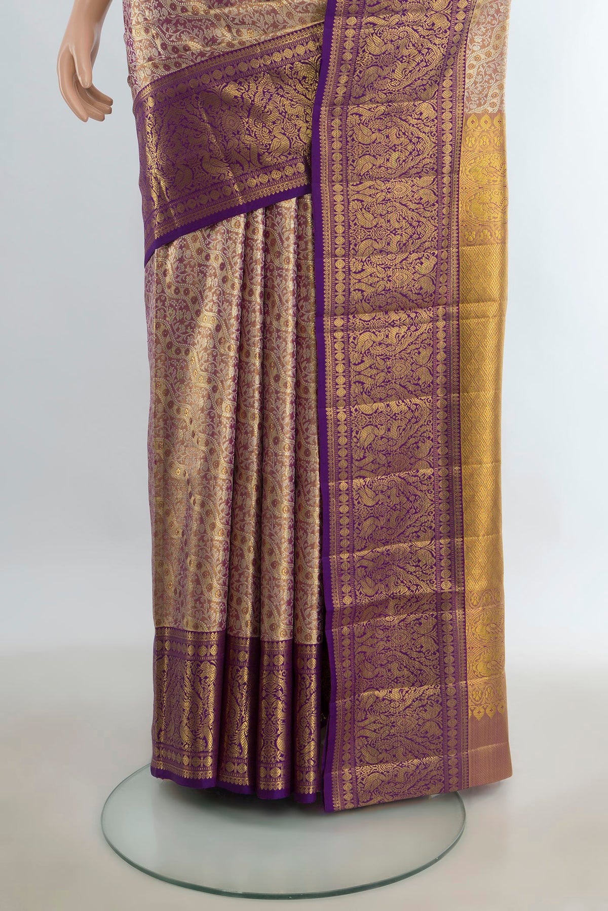 Pleats and pallu of Pure Silk Pure Zari Golden Kanjivaram Saree with Zari Butta on the body and Silk Border. 