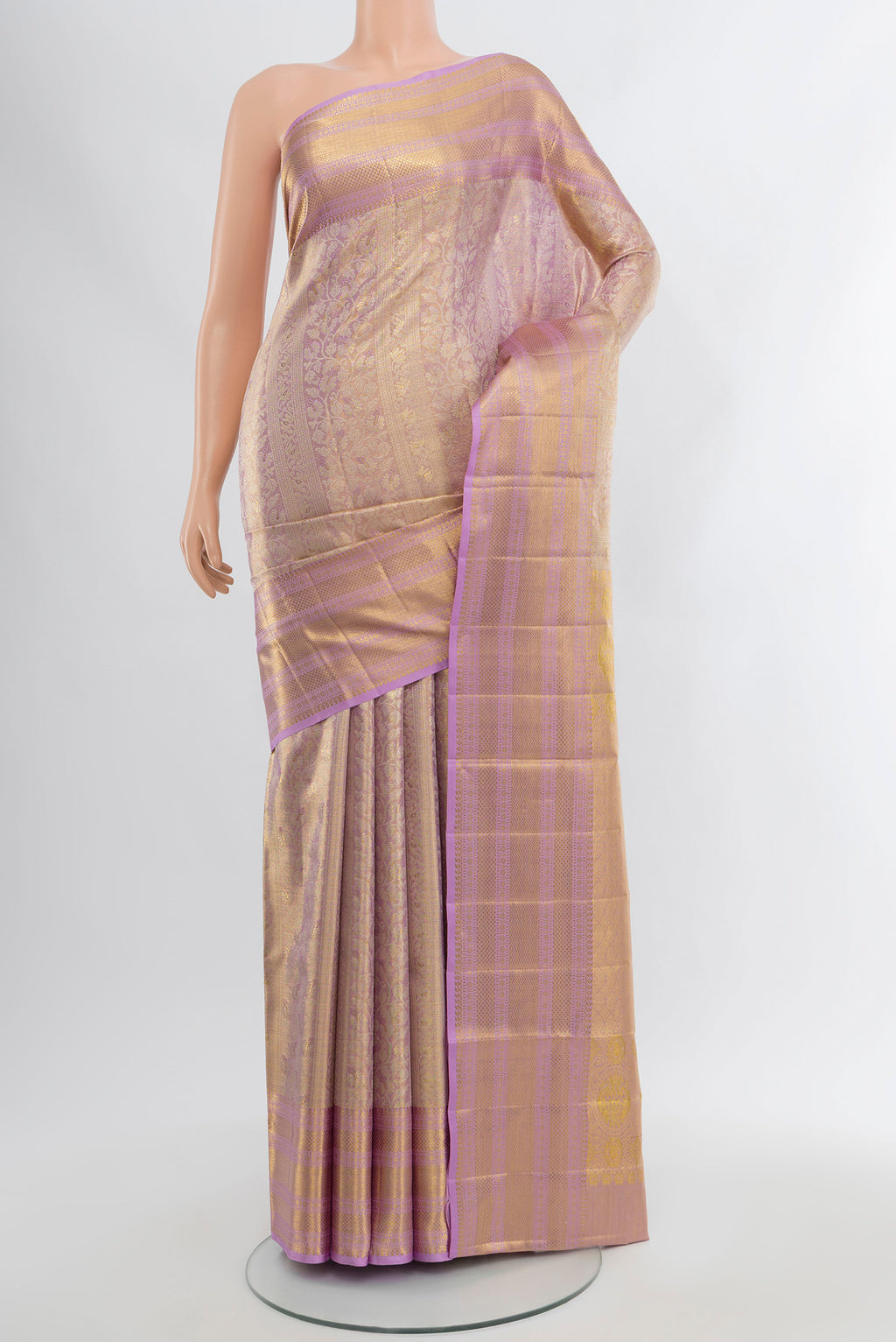 Lavender Kanjivaram Tissue Silk Saree with Zari Brocade on the body and Zari Border.  displayed on a mannequin