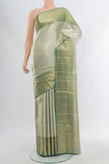 Silver Kanjivaram Tissue Silk Saree with Zari Brocade on the body and Zari Border.  displayed on a mannequin