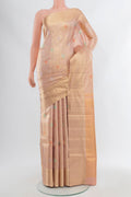 Peach Kanjivaram Silk Saree with Zari Brocade on the body and Zari Border.  displayed on a mannequin
