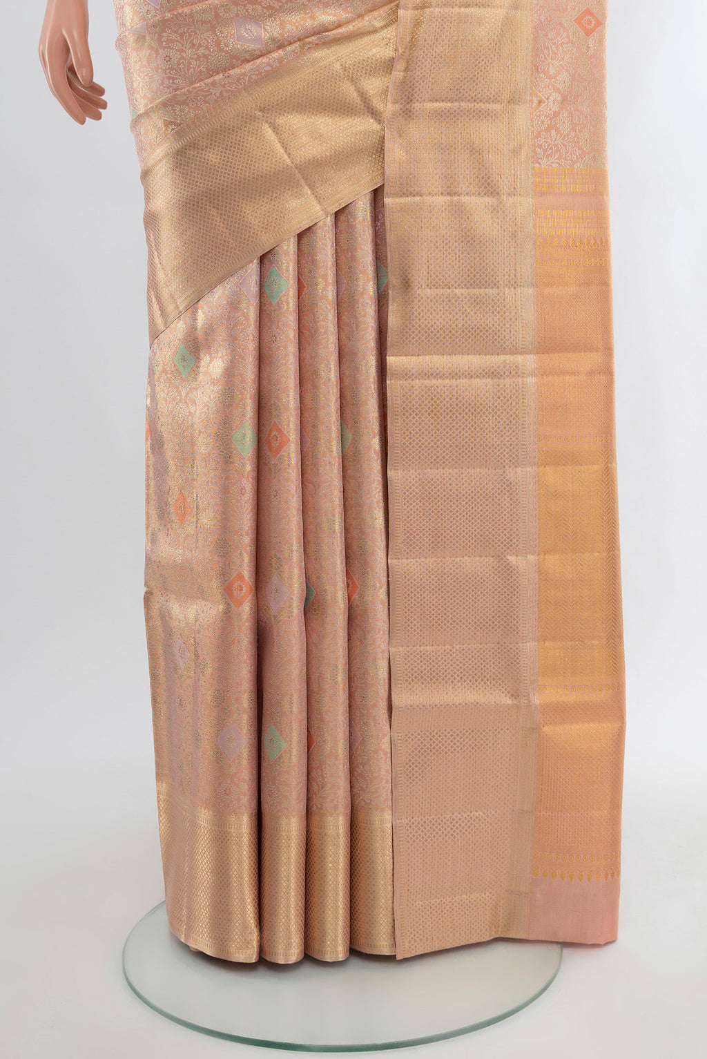 Pleats and pallu of Peach Kanjivaram Silk Saree with Zari Brocade on the body and Zari Border. 