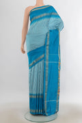 Pure Silk Sky Blue Pochampally Saree with Checked design on the body and Zari Border.  displayed on a mannequin