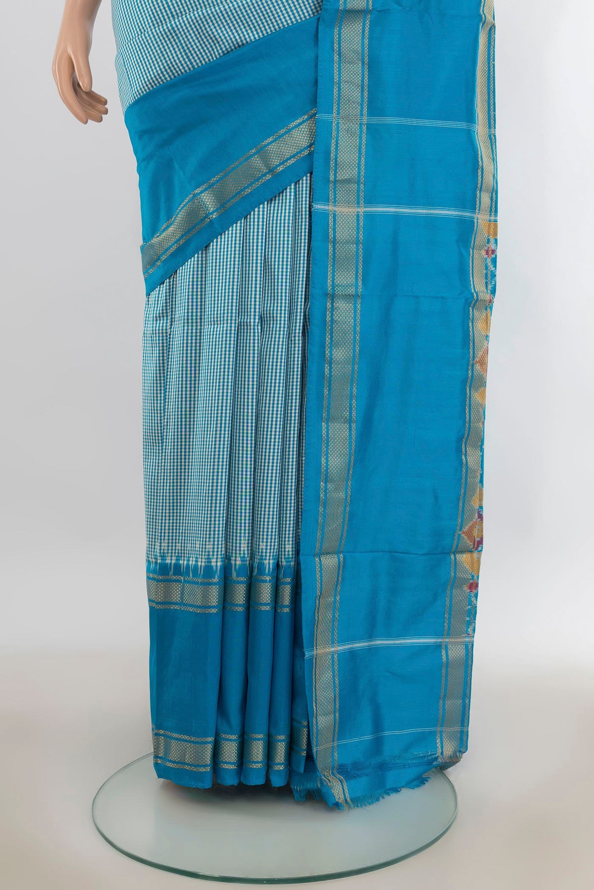 Pleats and pallu of Pure Silk Sky Blue Pochampally Saree with Checked design on the body and Zari Border. 