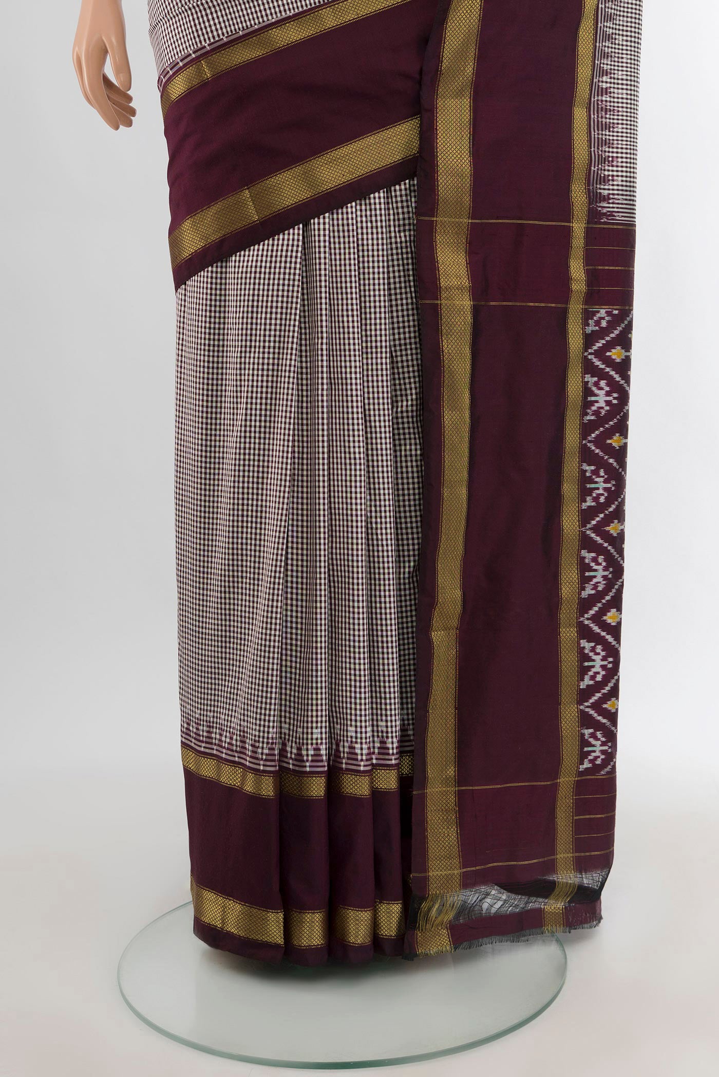 Pleats and pallu of Coffee Brown Pochampally Silk Nine Yards Saree with Pure Ikat on the body and Zari Border. 