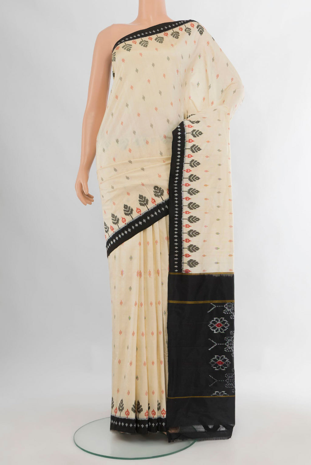 Pure Silk Cream Pochampally Saree with Pure Ikat on the body and Ikat Border.  displayed on a mannequin