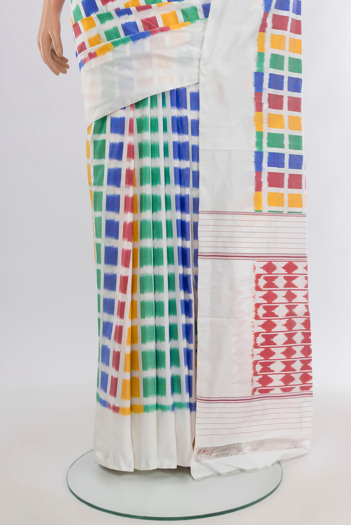 Pleats and pallu of Multi Color Pochampally Silk Saree with Pure Ikat on the body and Plain Border. 