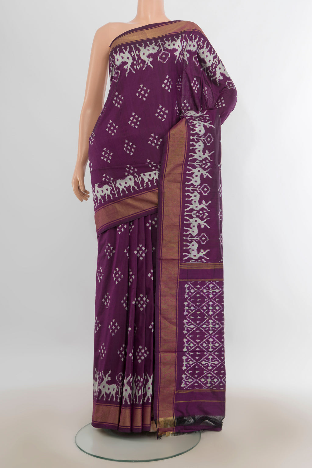 Pure Silk Purple Pochampally Saree with Pure Ikat on the body and Zari Border.  displayed on a mannequin