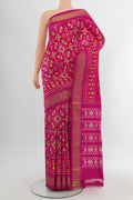 Multi Color Pochampally Saree with Ikat Print on the body and Silk Border.  displayed on a mannequin
