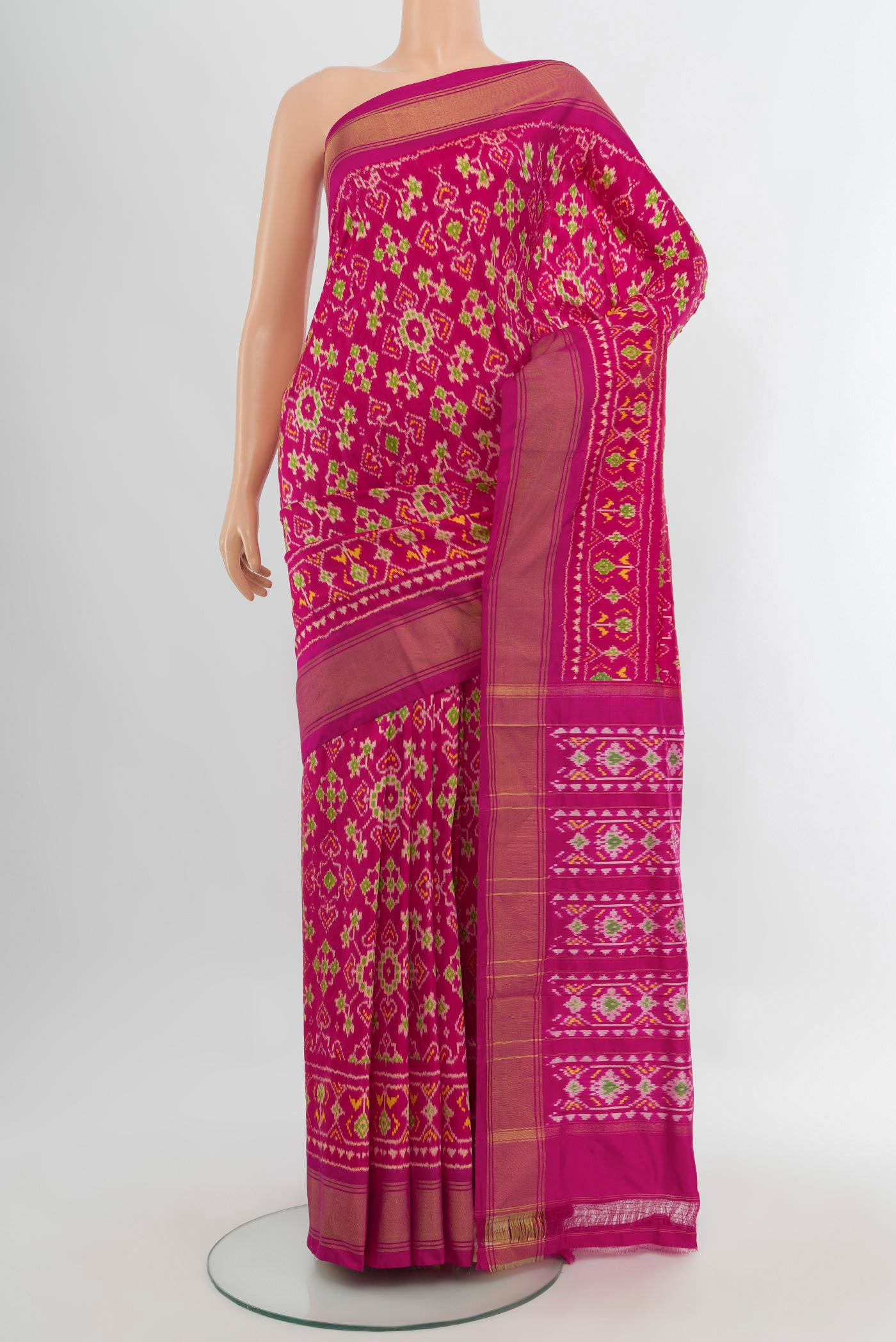 Multi Color Pochampally Saree with Ikat Print on the body and Silk Border.  displayed on a mannequin