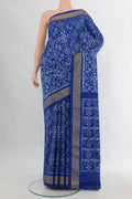 Pure Silk Royal Blue Pochampally Saree with Pure Ikat on the body and Zari Border.  displayed on a mannequin