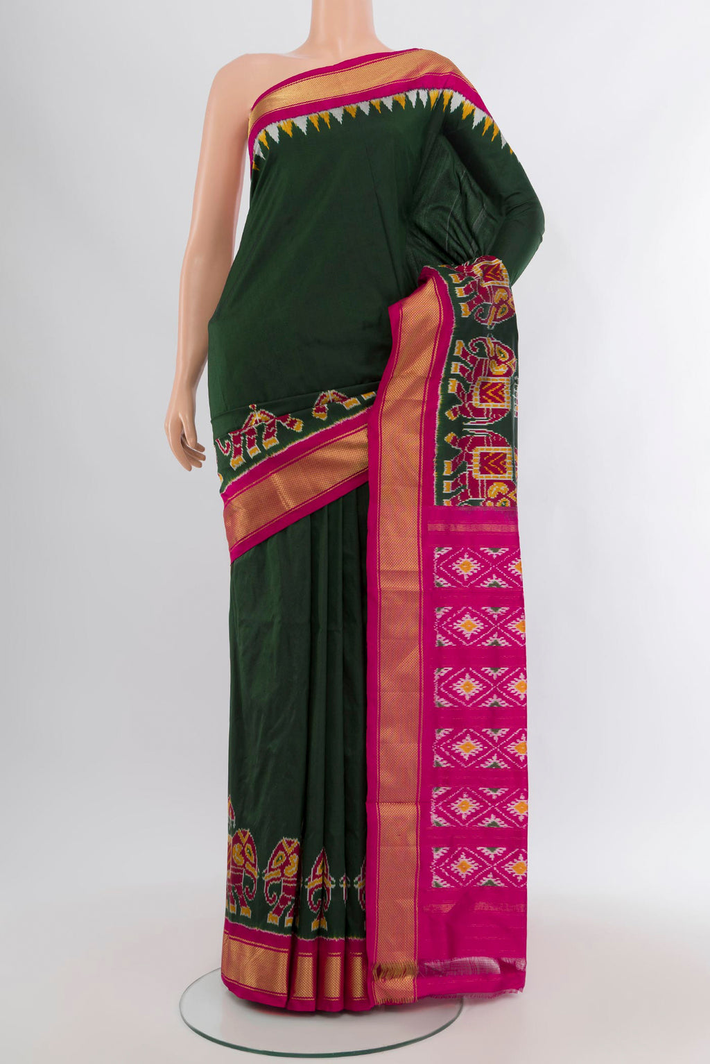 Bottle Green Pochampally Silk Saree with Plain Body and Zari Border.  displayed on a mannequin
