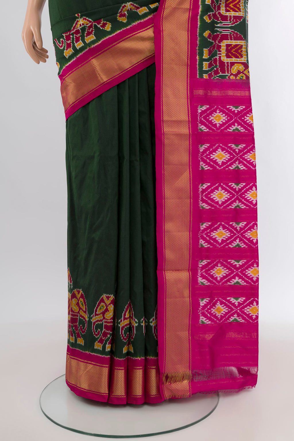 Pleats and pallu of Bottle Green Pochampally Silk Saree with Plain Body and Zari Border. 