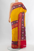 Yellow Pochampally Silk Saree with Plain Body and Zari Border.  displayed on a mannequin