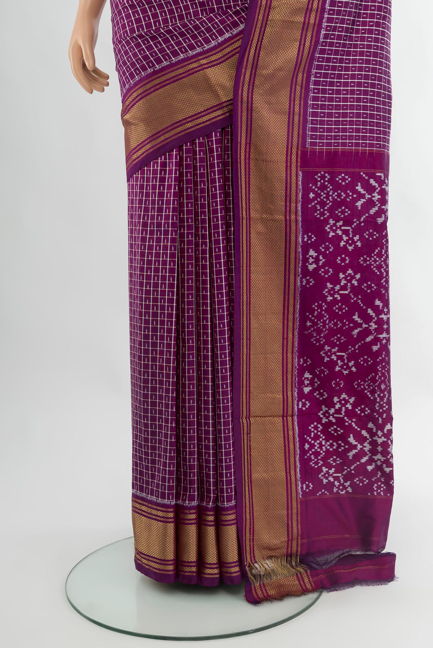 Pleats and pallu of Purple Pochampally Silk Saree with Ikat design on the body and Zari Border. 