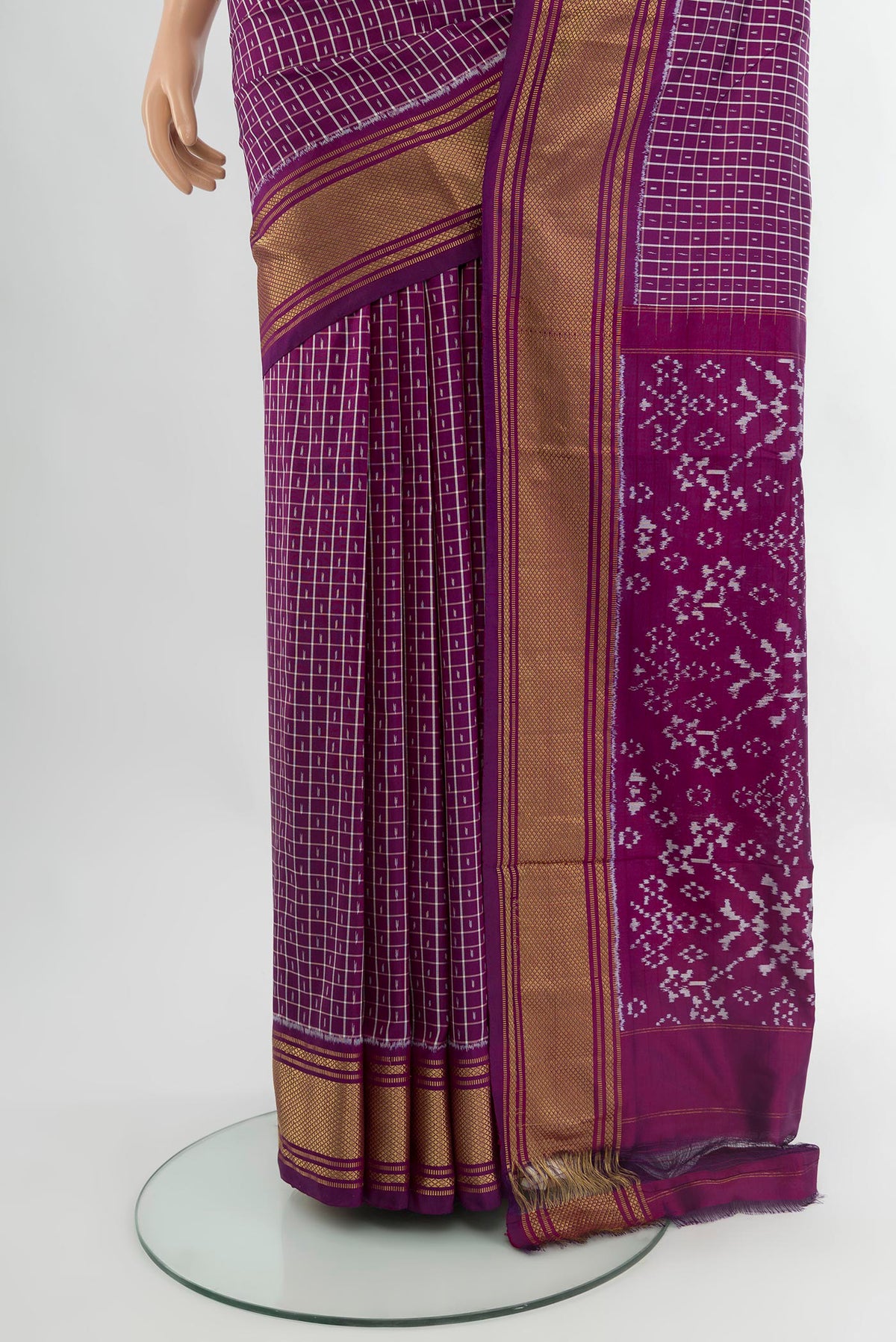 Pleats and pallu of Purple Pochampally Silk Saree with Ikat design on the body and Zari Border. 