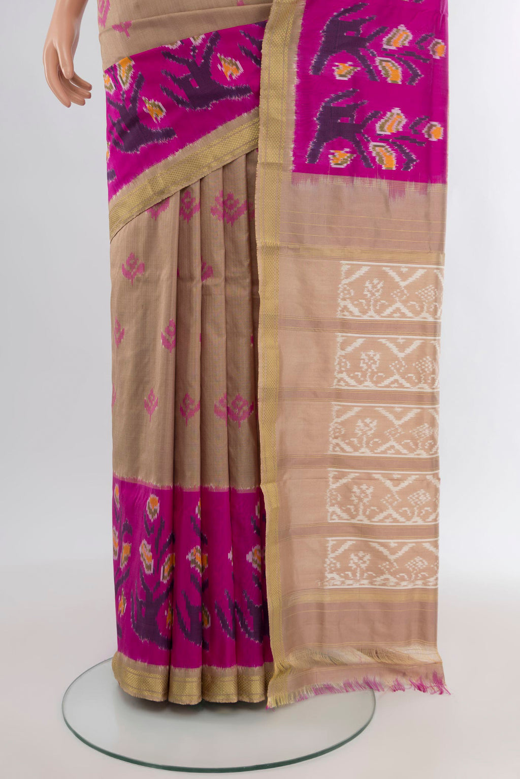 Pleats and pallu of Dark Beige Pochampally Silk Saree with Pure Ikat on the body and Ikat Border. 