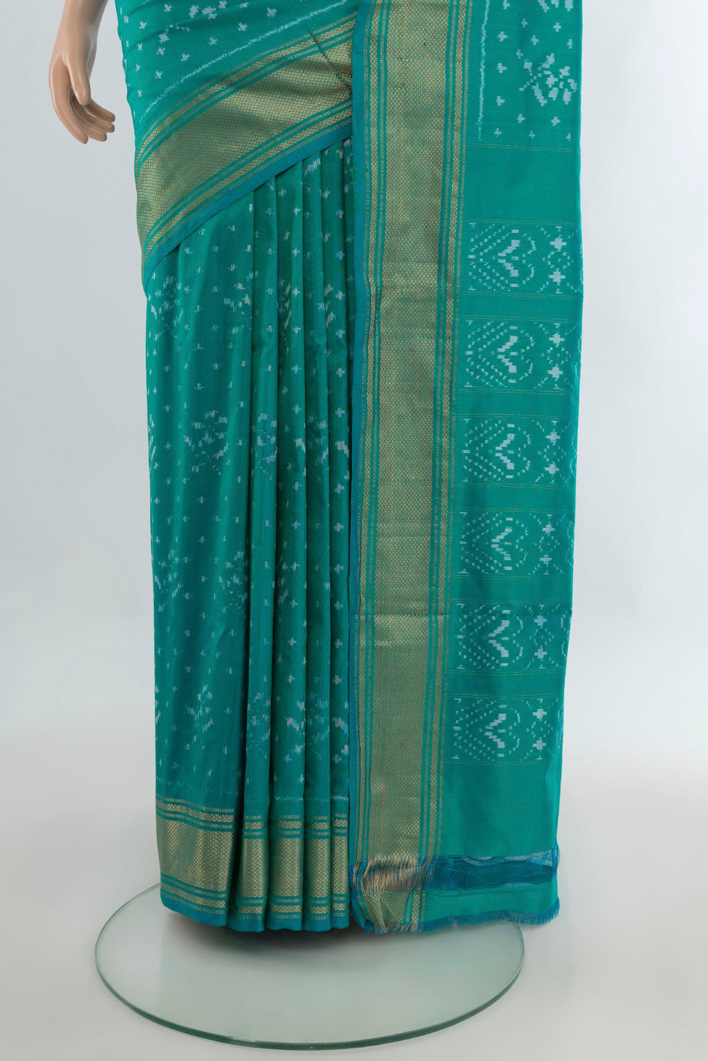 Pleats and pallu of Pure Silk Sea Green Pochampally Saree with Pure Ikat on the body and Zari Border. 