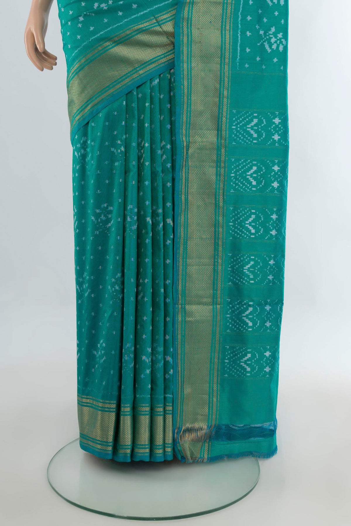 Pleats and pallu of Pure Silk Sea Green Pochampally Saree with Pure Ikat on the body and Zari Border. 