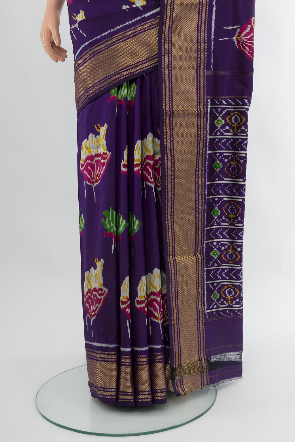 Pleats and pallu of Violet Pochampally Silk Saree with Pure Ikat on the body and Zari Border. 