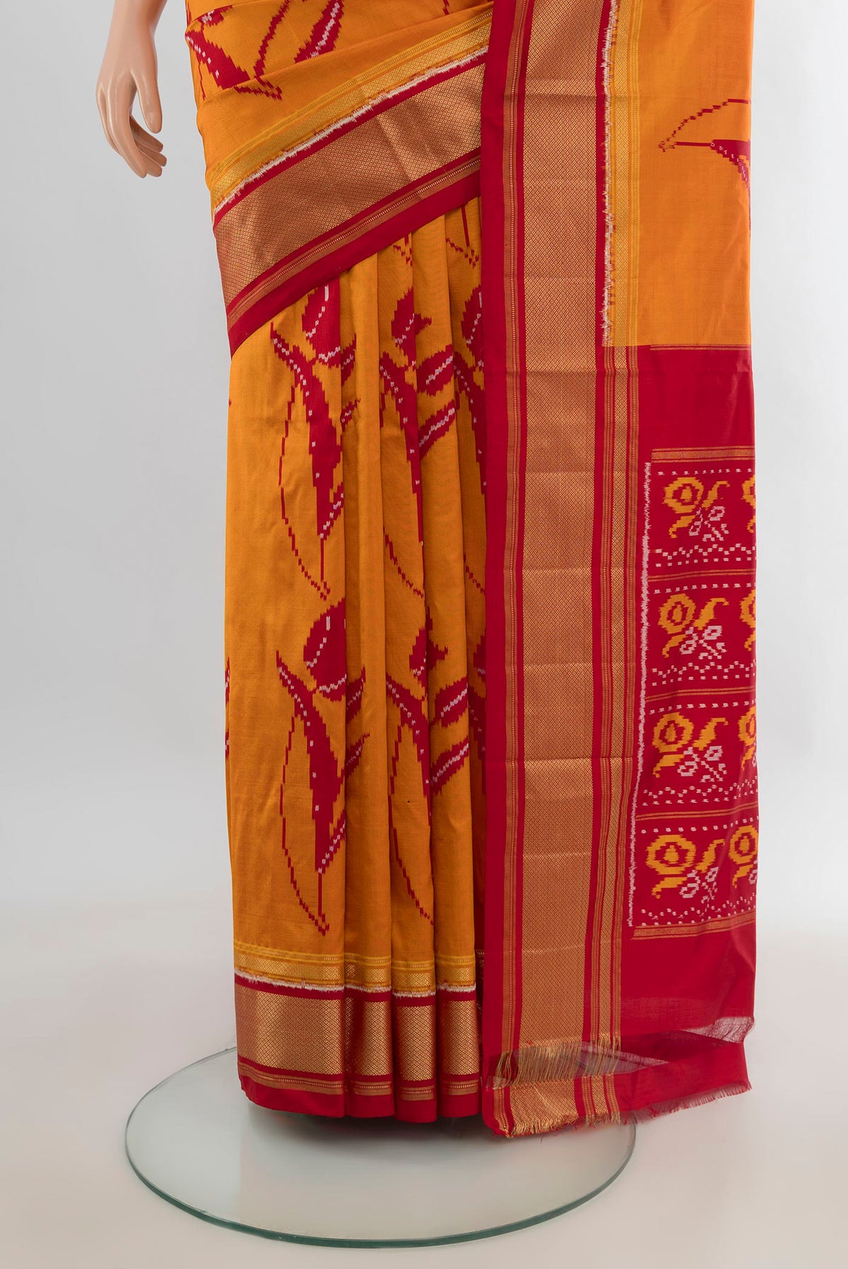 Pleats and pallu of Pure Silk Yellow Pochampally Saree with Pure Ikat on the body and Zari Border. 