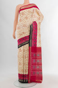 Cream Pochampally Silk Saree with Pure Ikat on the body and Zari Border.  displayed on a mannequin
