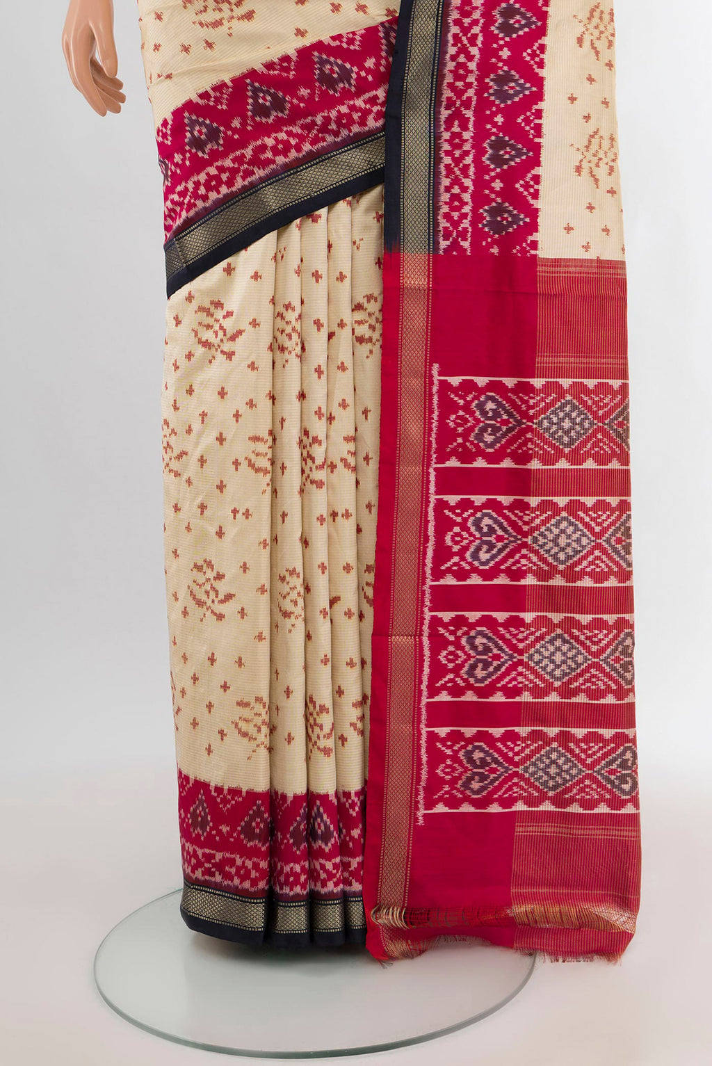 Pleats and pallu of Cream Pochampally Silk Saree with Pure Ikat on the body and Zari Border. 