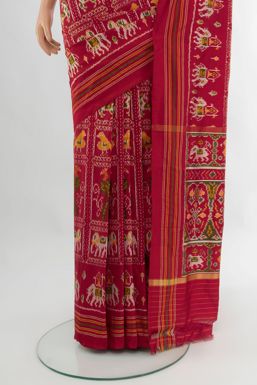 Pleats and pallu of Maroon Pochampally Silk Saree with Pure Ikat on the body and Plain Border. 