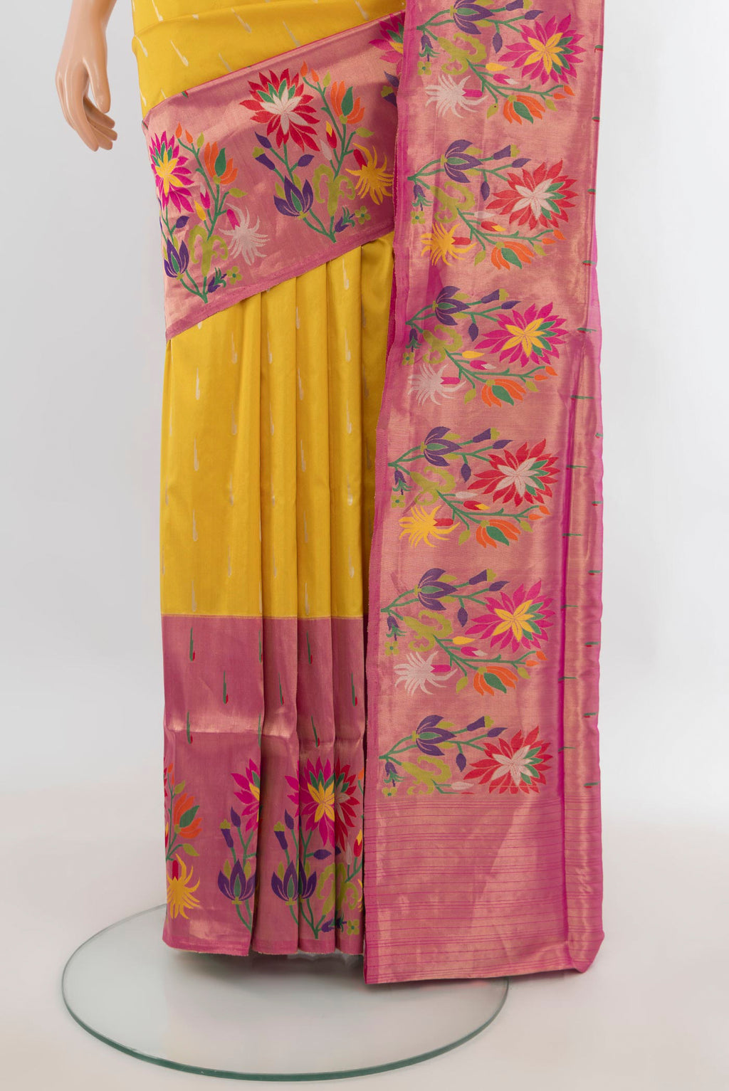 Pleats and pallu of Pure Silk Yellow Banarasi Saree with Zari Butta on the body and Fancy Border. 