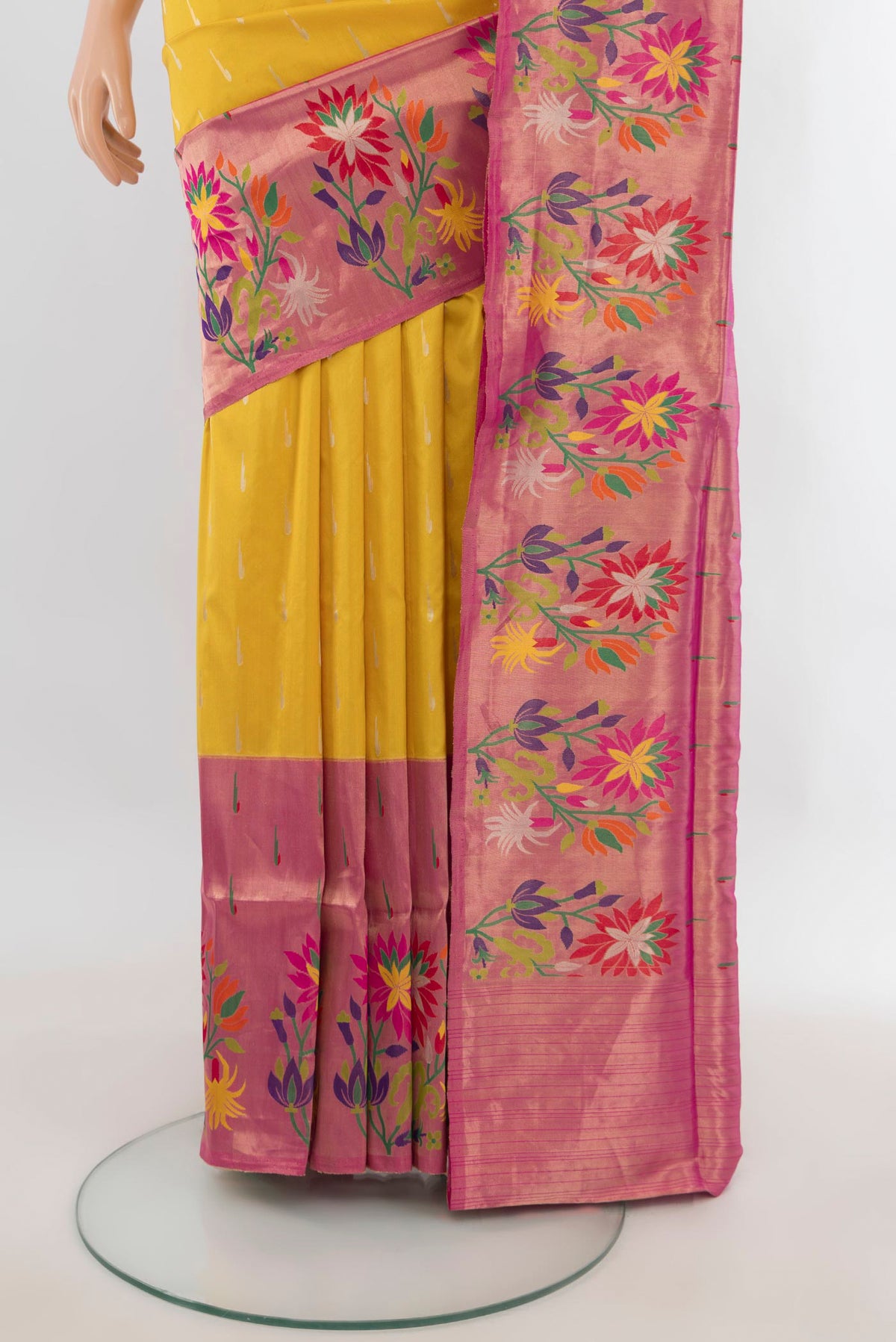 Pleats and pallu of Pure Silk Yellow Banarasi Saree with Zari Butta on the body and Fancy Border. 