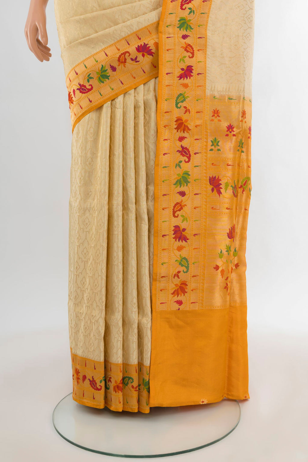 Pleats and pallu of Cream Banarasi Silk Saree with Zari Brocade on the body and Paithani Border. 