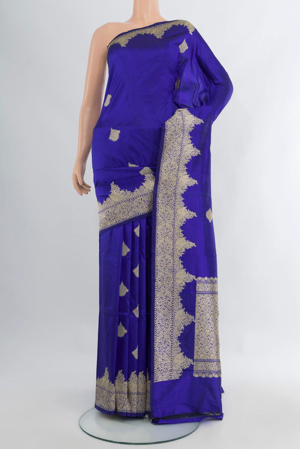 Royal Blue Banarasi Katan Silk Saree with Zari Butta on the body and Fancy Border.  displayed on a mannequin