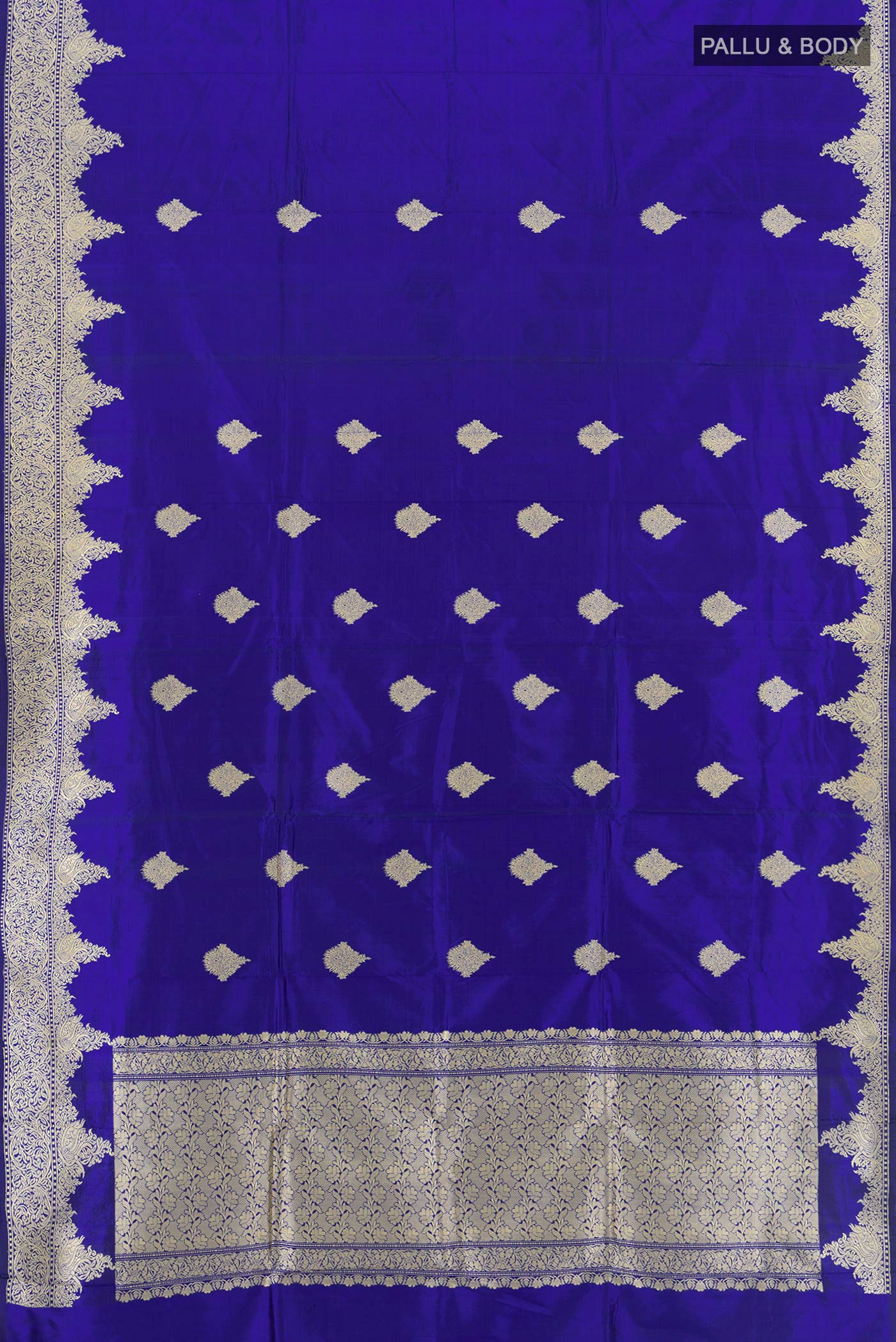 Flat view of Royal Blue Banarasi Katan Silk Saree with Zari Butta on the body and Fancy Border. 
