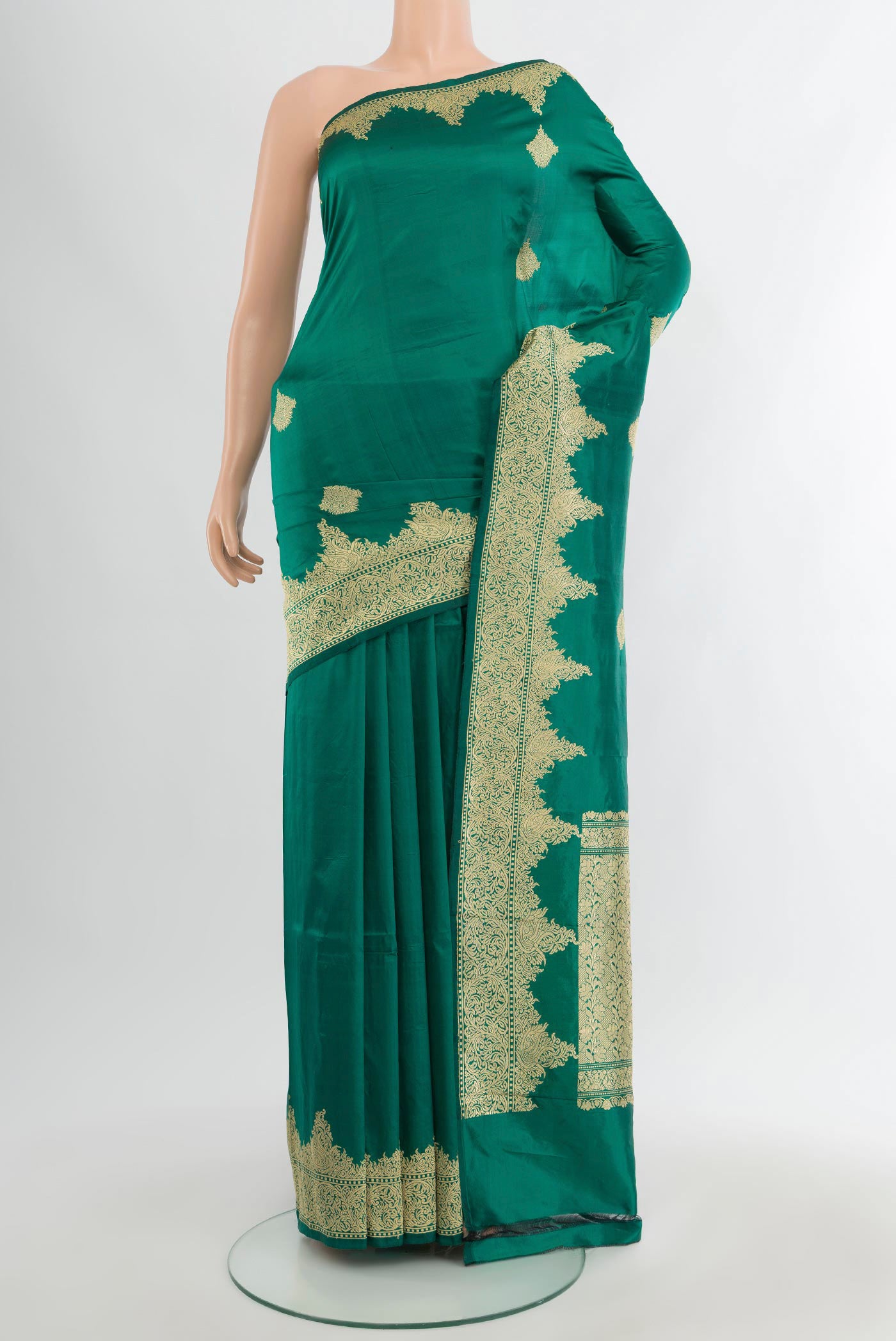 Teal Banarasi Katan Silk Saree with Zari Butta on the body and Zari Border.  displayed on a mannequin