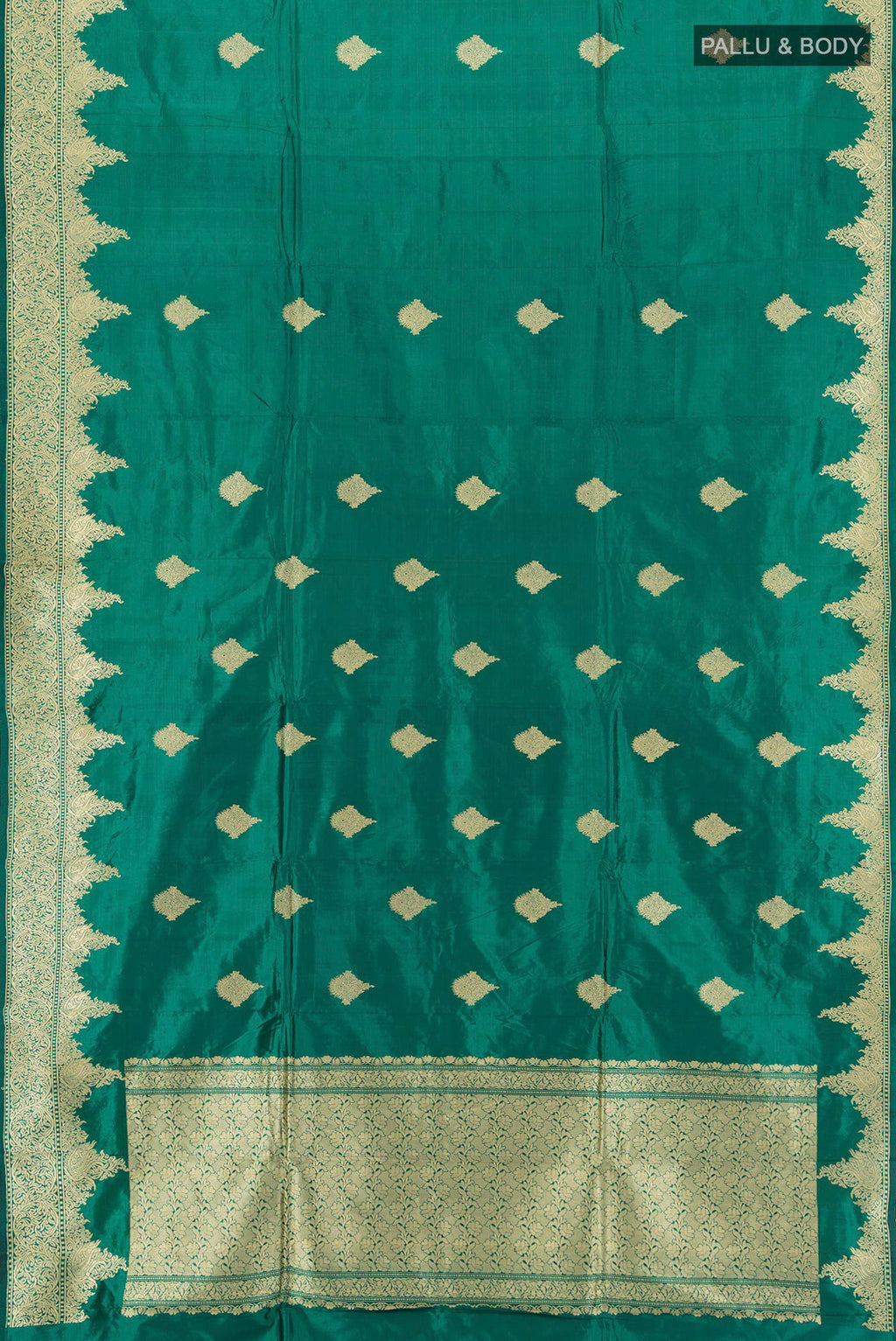 Flat view of Teal Banarasi Katan Silk Saree with Zari Butta on the body and Zari Border. 