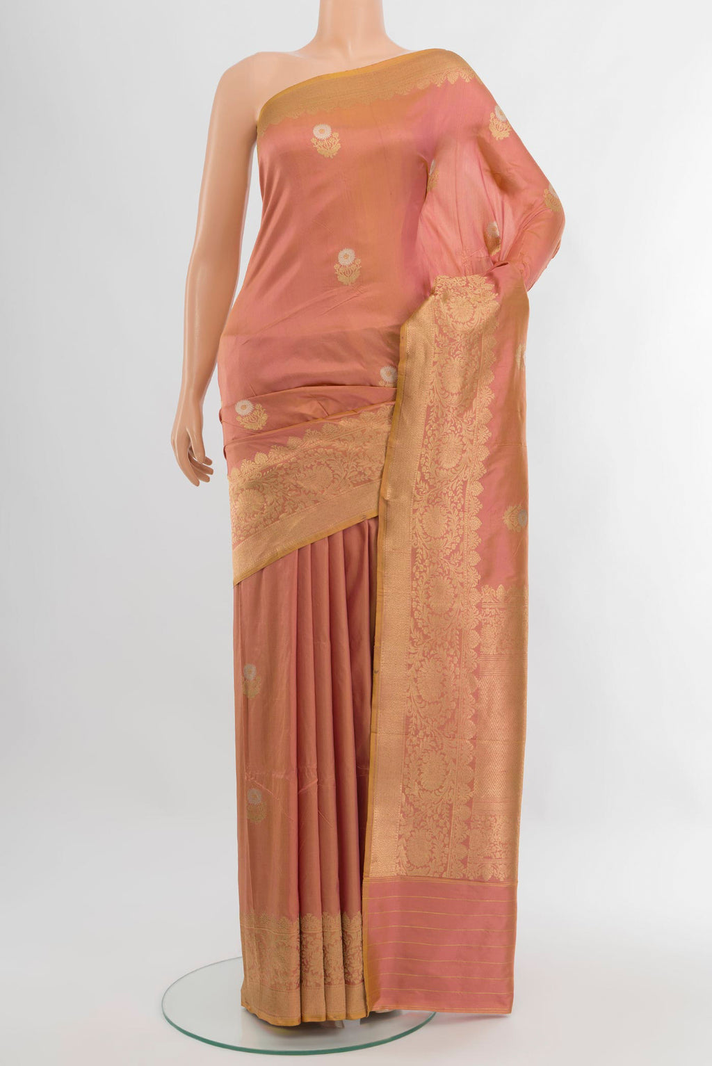 Peach Banarasi Katan Silk Saree with Zari Butta on the body and Zari Border.  displayed on a mannequin