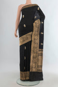Pure Silk Black Banarasi Katan Saree with Zari Butta on the body and Zari Border.  displayed on a mannequin