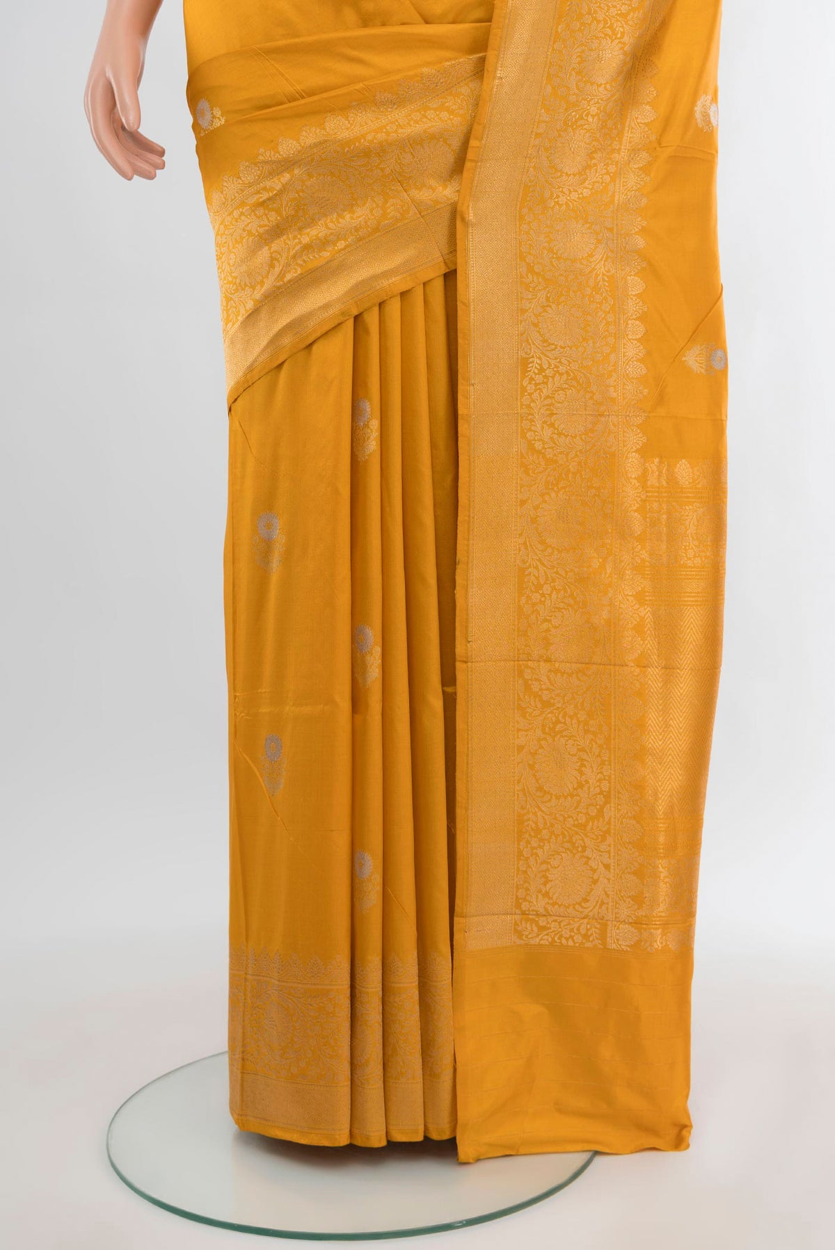 Pleats and pallu of Yellow Banarasi Katan Silk Saree with Zari Butta on the body and Zari Border. 