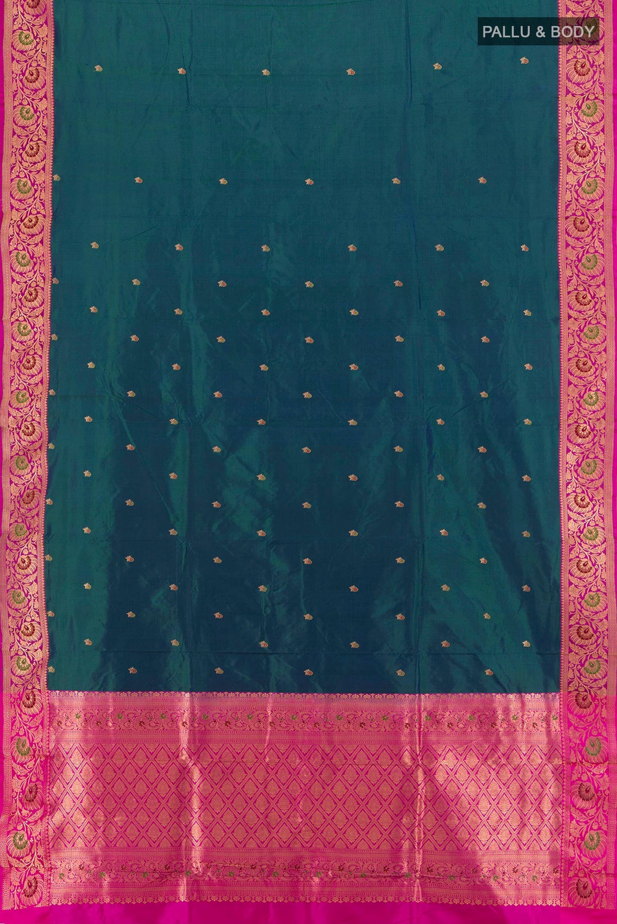 Flat view of Peacock Blue Banarasi Katan Silk Saree with Zari Butta on the body and Zari Border. 