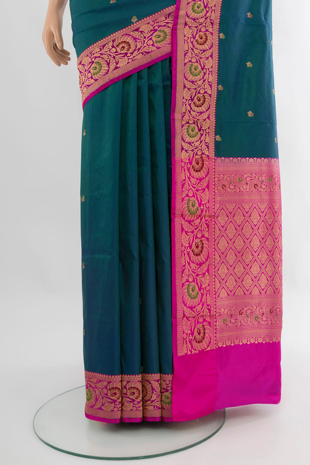 Pleats and pallu of Peacock Blue Banarasi Katan Silk Saree with Zari Butta on the body and Zari Border. 