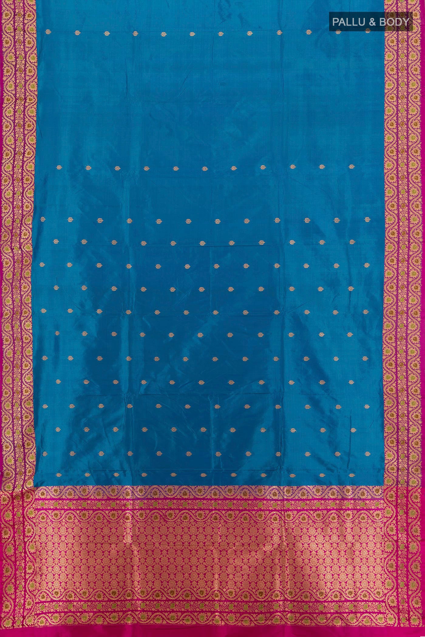 Flat view of Blue Banarasi Katan Silk Saree with Zari Butta on the body and Zari Border. 